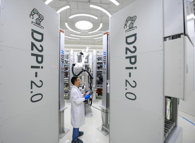 (260709) -- SHANGHAI, July 9, 2026 (Xinhua) -- A staff member works at a joint laboratory for AI-powered protein manufacturing under the National Facility for Protein Science in Shanghai, in Pudong, east China's Shanghai, July 7, 2026. All the ten national key scientific and technological infrastructures that have been built and put into operation in Shanghai are now open to public use.
   These infrastructures, which include the Shanghai Synchrotron Radiation Facility (SSRF) and the National Facility for Protein Science in Shanghai, serve as important engines for the integration of science and technology innovation and industries in the city. (Xinhua/Chen Shuo)