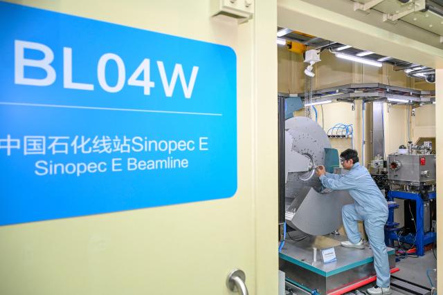 (260709) -- SHANGHAI, July 9, 2026 (Xinhua) -- A staff member works at the Sinopec E Beamline in the Shanghai Synchrotron Radiation Facility (SSRF) in Pudong, east China's Shanghai, July 8, 2026. All the ten national key scientific and technological infrastructures that have been built and put into operation in Shanghai are now open to public use.
   These infrastructures, which include the Shanghai Synchrotron Radiation Facility (SSRF) and the National Facility for Protein Science in Shanghai, serve as important engines for the integration of science and technology innovation and industries in the city. (Xinhua/Chen Shuo)