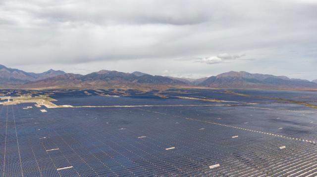 (260709) -- DELINGHA, July 9, 2026 (Xinhua) -- An aerial drone photo taken on July 8, 2026 shows photovoltaic panels at the joint complex for the Huadian Delingha 1-gigawatt solar energy storage project and 3-megawatt photovoltaic hydrogen production project in Delingha, northwest China's Qinghai Province.
  The two projects have generated more than 4 billion kilowatt-hours of electricity, according to China Huadian Corporation, the operator of the duo.
  The projects combine solar power generation, green hydrogen production, and energy storage into a single complex, an approach that helps address the intermittent nature of solar power and boost renewable energy use in desert areas. (Xinhua/Wang Yan)
