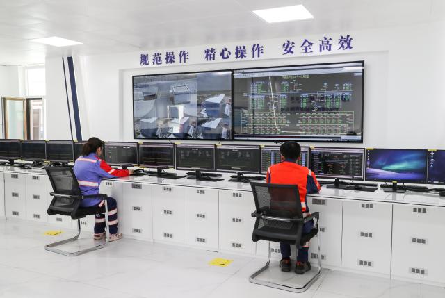 (260709) -- DELINGHA, July 9, 2026 (Xinhua) -- Staff members work at the central control room of the joint complex for the Huadian Delingha 1-gigawatt solar energy storage project and 3-megawatt photovoltaic hydrogen production project in Delingha, northwest China's Qinghai Province, July 8, 2026.
  The two projects have generated more than 4 billion kilowatt-hours of electricity, according to China Huadian Corporation, the operator of the duo.
  The projects combine solar power generation, green hydrogen production, and energy storage into a single complex, an approach that helps address the intermittent nature of solar power and boost renewable energy use in desert areas. (Xinhua/Shan Yuqi)