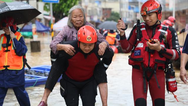 (260709) -- NANNING, July 9, 2026 (Xinhua) -- Rescuers evacuate a senior resident in Napeng Town of Qinzhou City, south China's Guangxi Zhuang Autonomous Region, July 8, 2026. Recent extreme rainstorms triggered by Typhoon Maysak, the 10th typhoon of the year, have caused severe flooding in parts of Guangxi in the Pearl River basin.
  Guangxi is continuing its search and rescue operations for missing persons, enhancing resettlement services for affected residents and advancing post-disaster reconstruction. (Photo by Ao Shuaichang/Xinhua)
