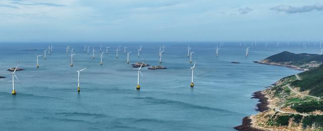 (260709) -- FUZHOU, July 9, 2026 (Xinhua) -- A drone photo taken on June 30, 2026 shows an offshore wind farm on the waters of Pingtan, southeast China's Fujian Province.
  The province of Fujian is rich in high-quality clean energy resources like wind power, solar energy, hydro power and nuclear power.
   In recent years, Fujian has relied on its local clean energy endowment and geographical advantages to build its smart new power grids and develop the region as a major clean energy hub in southeast China. 
    It has accelerated the construction of power transmission channels, steadily upgraded urban and rural distribution networks, promoted the construction of smart micro-grids, continuously revitalized its clean energy advantages, and consolidated the foundation of energy security through the construction of smart new power grids. (Xinhua/Lin Shanchuan)