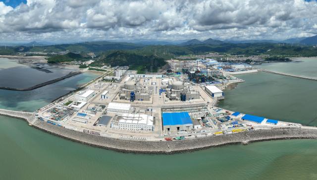 (260709) -- FUZHOU, July 9, 2026 (Xinhua) -- An aerial drone panorama photo taken on July 7, 2026 shows the construction site of the unit 3 of the Zhangzhou nuclear power project in Yunxiao County, southeast China's Fujian Province.
  The province of Fujian is rich in high-quality clean energy resources like wind power, solar energy, hydro power and nuclear power.
   In recent years, Fujian has relied on its local clean energy endowment and geographical advantages to build its smart new power grids and develop the region as a major clean energy hub in southeast China. 
    It has accelerated the construction of power transmission channels, steadily upgraded urban and rural distribution networks, promoted the construction of smart micro-grids, continuously revitalized its clean energy advantages, and consolidated the foundation of energy security through the construction of smart new power grids. (Xinhua/Lin Shanchuan)