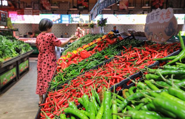 (260709) -- BEIJING, July 9, 2026 (Xinhua) -- A consumer shops at a supermarket in Congjiang County, southwest China's Guizhou Province, July 9, 2026.
  The consumer price index (CPI), a main gauge of inflation, rose 1 percent year on year in the first six months of 2026, data from the National Bureau of Statistics (NBS) revealed. In June alone, the CPI gained 1 percent year on year and edged down 0.3 percent month on month, with the core CPI, which excludes food and energy prices, increasing by 1 percent year on year, continuing the moderate upward trend. (Photo by Luo Jinglai/Xinhua)