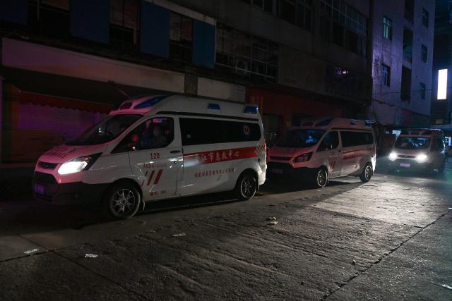 (260709) -- JINJIANG, July 9, 2026 (Xinhua) -- Ambulances are on standby after a fire broke out at a shoe factory in Jiangtou Village, Chendai Township of Jinjiang City, southeast China's Fujian Province, on July 9, 2026. Twenty-eight people have been killed following a fire at a shoe factory in Jinjiang City on Thursday, local authorities said. (Xinhua/Zhou Yi)