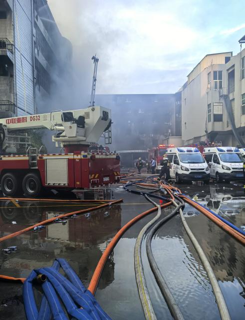 (260709) -- JINJIANG, July 9, 2026 (Xinhua) -- Firefighters work after a fire broke out at a shoe factory in Jiangtou Village, Chendai Township of Jinjiang City, southeast China's Fujian Province, on July 9, 2026. Twenty-eight people have been killed following a fire at a shoe factory in Jinjiang City on Thursday, local authorities said. (Xinhua/Wang Cheng)