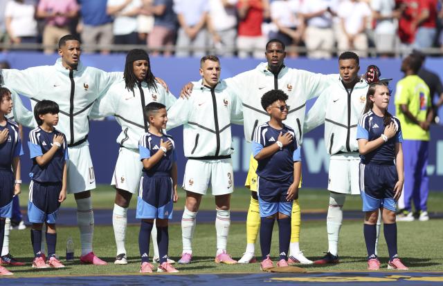 (260710) -- BOSTON, July 10, 2026 (Xinhua) -- Players of France sing the national anthem before the quarter final match between France and Morocco at the 2026 FIFA World Cup at Boston Stadium in Boston, the United States, July 9, 2026. (Xinhua/Xu Zijian)