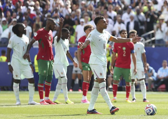 (260710) -- BOSTON, July 10, 2026 (Xinhua) -- Kylian Mbappe (front) of France prepares to shoot a penalty kick during the quarter final match between France and Morocco at the 2026 FIFA World Cup at Boston Stadium in Boston, the United States, July 9, 2026. (Xinhua/Zhang Chen)