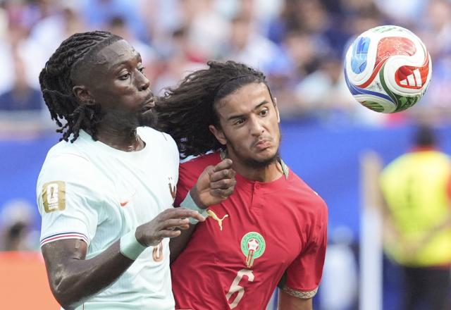(260710) -- BOSTON, July 10, 2026 (Xinhua) -- Manu Kone (L) of France jumps for a header against Ayoub Bouaddi of Morocco during the quarter final match between France and Morocco at the 2026 FIFA World Cup at Boston Stadium in Boston, the United States, July 9, 2026. (Xinhua/Lui Siu Wai)