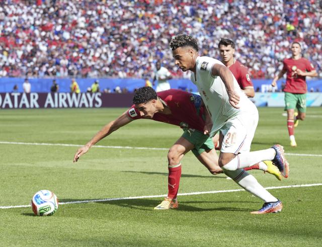 (260710) -- BOSTON, July 10, 2026 (Xinhua) -- Desire Doue (front R) of France and Achraf Hakimi (front L) of Morocco compete during the quarter final match between France and Morocco at the 2026 FIFA World Cup at Boston Stadium in Boston, the United States, July 9, 2026. (Xinhua/Lui Siu Wai)