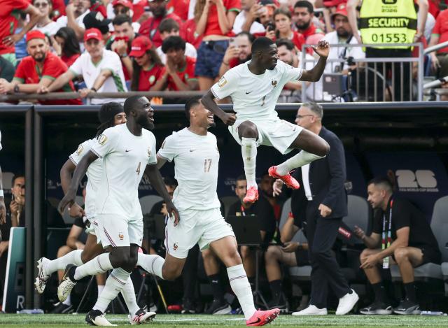 (260710) -- BOSTON, July 10, 2026 (Xinhua) -- Ousmane Dembele (top) of France celebrates scoring with his teammates during the quarter final match between France and Morocco at the 2026 FIFA World Cup at Boston Stadium in Boston, the United States, July 9, 2026. (Xinhua/Zhang Chen)