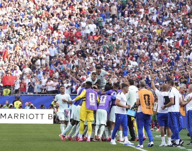 (260710) -- BOSTON, July 10, 2026 (Xinhua) -- Players of France celebrate scoring during the quarter final match between France and Morocco at the 2026 FIFA World Cup at Boston Stadium in Boston, the United States, July 9, 2026. (Xinhua/Lui Siu Wai)