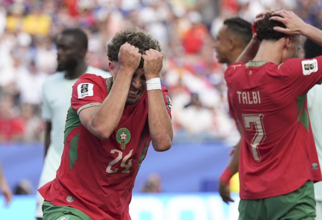 (260710) -- BOSTON, July 10, 2026 (Xinhua) -- Neil El Aynaoui of Morocco reacts after missing a chance to score during the quarter final match between France and Morocco at the 2026 FIFA World Cup at Boston Stadium in Boston, the United States, July 9, 2026. (Xinhua/Lui Siu Wai)