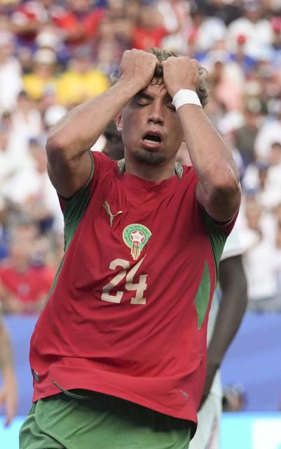 (260710) -- BOSTON, July 10, 2026 (Xinhua) -- Neil El Aynaoui of Morocco reacts after missing a chance to score during the quarter final match between France and Morocco at the 2026 FIFA World Cup at Boston Stadium in Boston, the United States, July 9, 2026. (Xinhua/Lui Siu Wai)