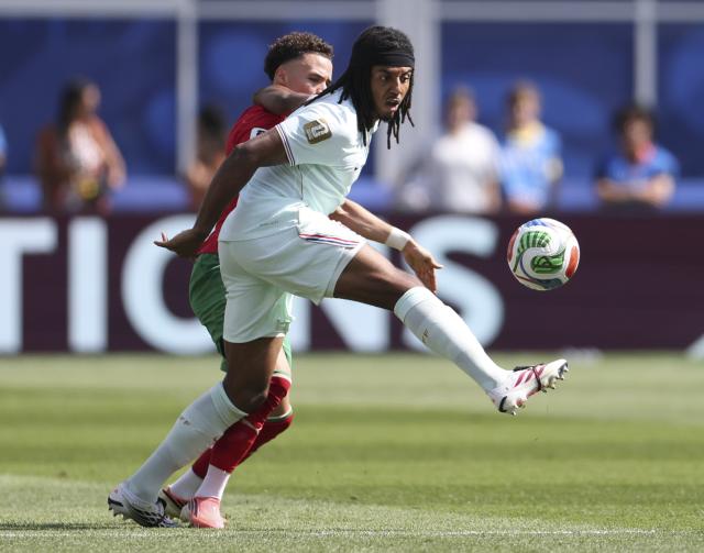 (260710) -- BOSTON, July 10, 2026 (Xinhua) -- Jules Kunde (front) of France competes during the quarter final match between France and Morocco at the 2026 FIFA World Cup at Boston Stadium in Boston, the United States, July 9, 2026. (Xinhua/Zhang Chen)