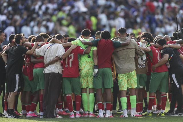 (260710) -- BOSTON, July 10, 2026 (Xinhua) -- Team Morocco huddle after the quarter final match between France and Morocco at the 2026 FIFA World Cup at Boston Stadium in Boston, the United States, July 9, 2026. (Xinhua/Hu Xingyu)