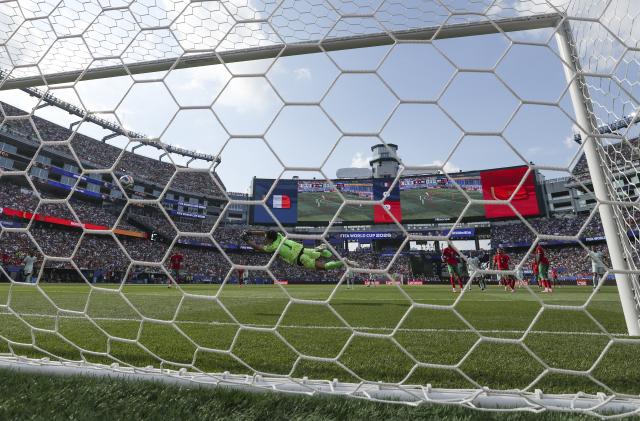 (260710) -- BOSTON, July 10, 2026 (Xinhua) -- Kylian Mbappe (1st R) of France shoots to score during the quarter final match between France and Morocco at the 2026 FIFA World Cup at Boston Stadium in Boston, the United States, July 9, 2026. (Xinhua/Hu Xingyu)