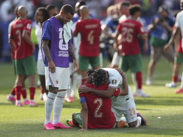 (260710) -- BOSTON, July 10, 2026 (Xinhua) -- Desire Doue (R) of France hugs Achraf Hakimi (C) of Morocco after the quarter final match between France and Morocco at the 2026 FIFA World Cup at Boston Stadium in Boston, the United States, July 9, 2026. (Xinhua/Hu Xingyu)