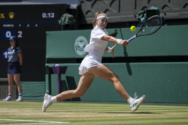(260710) -- LONDON, July 10, 2026 (Xinhua) -- Karolina Muchova of the Czech Republic hits a return during the women's semifinal match against Coco Gauff of the United States at the Wimbledon Tennis Championships in London, Britain, on July 9, 2026. (Photo by Stephen Chung/Xinhua)
