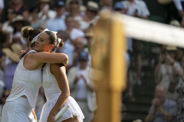 (260710) -- LONDON, July 10, 2026 (Xinhua) -- Linda Noskova of the Czech Republic and Marta Kostyuk of Ukraine hug after their women's semifinal match at the Wimbledon Tennis Championships in London, Britain, on July 9, 2026. (Photo by Stephen Chung/Xinhua)