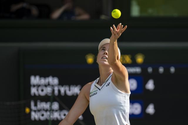 (260710) -- LONDON, July 10, 2026 (Xinhua) -- Linda Noskova of the Czech Republic serves during the women's semifinal match against Marta Kostyuk of Ukraine at the Wimbledon Tennis Championships in London, Britain, on July 9, 2026. (Photo by Stephen Chung/Xinhua)