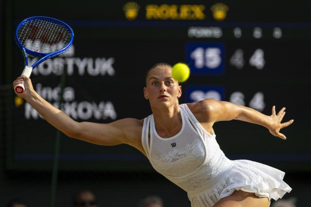 (260710) -- LONDON, July 10, 2026 (Xinhua) -- Marta Kostyuk of Ukraine hits a return during the women's semifinal match against Linda Noskova of the Czech Republic at the Wimbledon Tennis Championships in London, Britain, on July 9, 2026. (Photo by Stephen Chung/Xinhua)