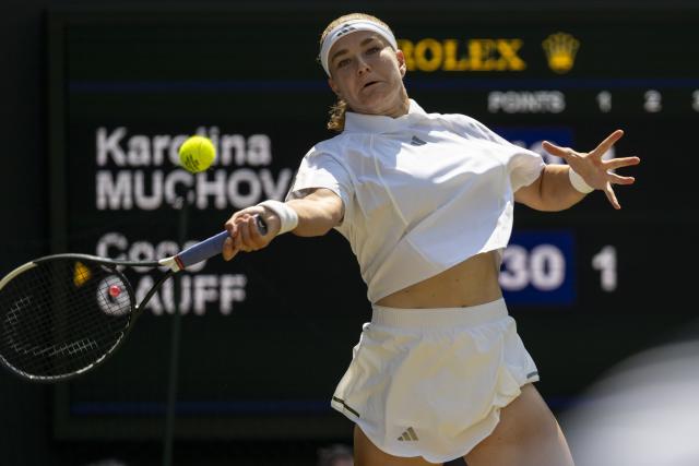 (260710) -- LONDON, July 10, 2026 (Xinhua) -- Karolina Muchova of the Czech Republic hits a return during the women's semifinal match against Coco Gauff of the United States at the Wimbledon Tennis Championships in London, Britain, on July 9, 2026. (Photo by Stephen Chung/Xinhua)