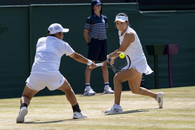 (260710) -- LONDON, July 10, 2026 (Xinhua) -- Jiang Xinyu/Xu Yifan (R) compete during the women's doubles quarterfinal match between Ingrid Neel (Estonia)/Giuliana Olmos (Mexico) and Jiang Xinyu/Xu Yifan of China at the Wimbledon Tennis Championships in London, Britain, on July 9, 2026. (Photo by Stephen Chung/Xinhua)