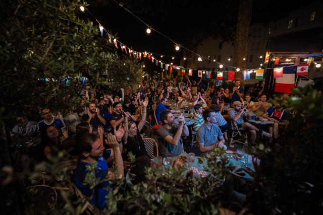 (260710) -- PARIS, July 10, 2026 (Xinhua) -- French fans react as they watch a broadcast of the 2026 FIFA World Cup quarterfinal football match between France and Morocco in Paris, France, July 9, 2026. (Photo by Aurelien Morissard/Xinhua)