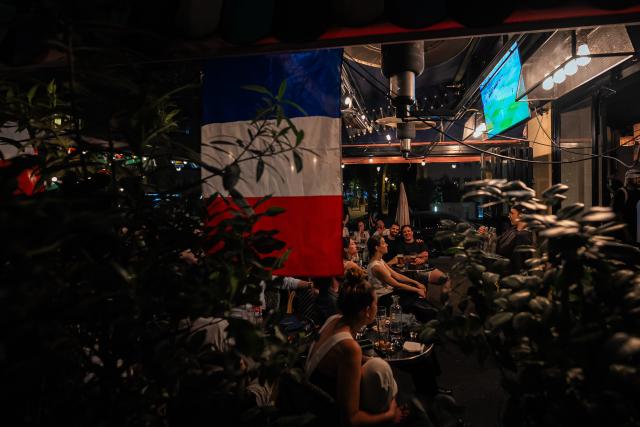 (260710) -- PARIS, July 10, 2026 (Xinhua) -- Fans watch a broadcast of the 2026 FIFA World Cup quarterfinal football match between France and Morocco in Paris, France, July 9, 2026. (Photo by Aurelien Morissard/Xinhua)