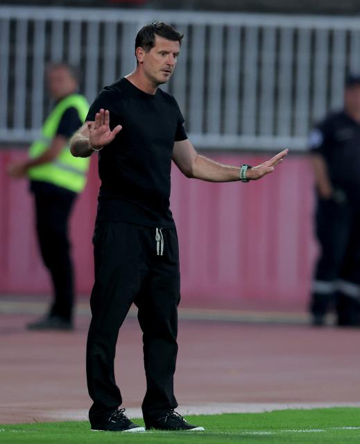 (260710) -- NOVI SAD, July 10, 2026 (Xinhua) -- Ferencvaros' head coach Balazs Borbely gestures during the 1st leg of the first qualifying round football match between Vojvodina and Ferencvaros at the 2026/27 UEFA Europa League in Novi Sad, Serbia, on July 9, 2026. (Photo by Predrag Milosavljevic/Xinhua)
