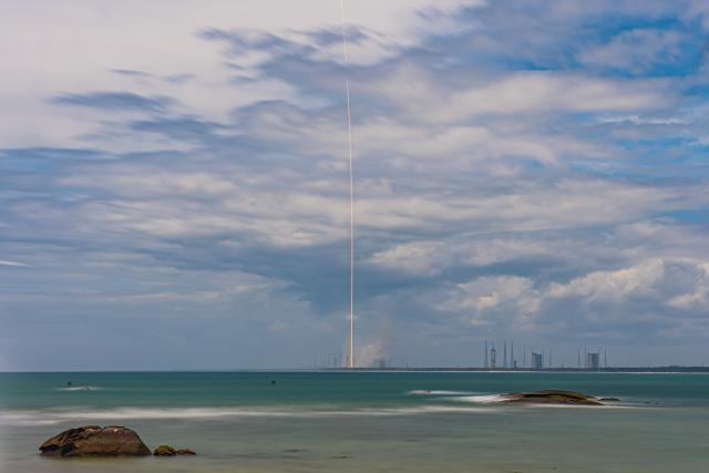 (260710) -- WENCHANG, July 10, 2026 (Xinhua) -- This long-exposure photo shows a Long March-10B carrier rocket blasting off from the Hainan commercial spacecraft launch site in Wenchang, south China's Hainan Province, July 10, 2026.
  China successfully launched the Long March-10B carrier rocket here on Friday, achieving its first-ever controlled recovery of a carrier rocket's first stage.
  The rocket, in its maiden flight, sent the payload into the preset orbit.
  After the separation of the rocket's first and second stages, the first stage returned and was successfully captured on a seaborne platform via a net-capture system. Both the launch and the first-stage recovery were successfully completed.
  This mission marked China's first successful controlled recovery of a carrier rocket's first stage, representing a major breakthrough in the country's reusable rocket technology. (Xinhua/Pu Xiaoxu)