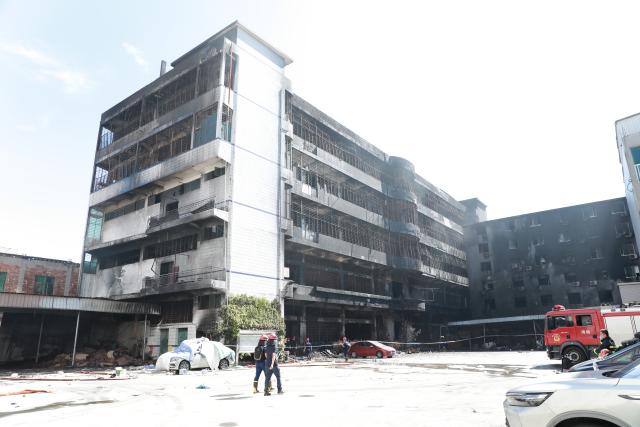 (260710) -- JINJIANG, July 10, 2026 (Xinhua) -- This photo taken on July 10, 2026 shows the site of a fire that broke out at a shoe factory in Jiangtou Village, Chendai Township of Jinjiang City, southeast China's Fujian Province.
  Search efforts largely concluded on Friday following a fatal fire that killed 28 people a day earlier at a shoe factory in the city of Jinjiang, local authorities said. (Xinhua/Chen Wang)