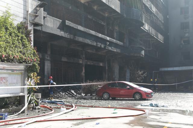 (260710) -- JINJIANG, July 10, 2026 (Xinhua) -- This photo taken on July 10, 2026 shows the site of a fire that broke out at a shoe factory in Jiangtou Village, Chendai Township of Jinjiang City, southeast China's Fujian Province.
  Search efforts largely concluded on Friday following a fatal fire that killed 28 people a day earlier at a shoe factory in the city of Jinjiang, local authorities said. (Xinhua/Chen Wang)