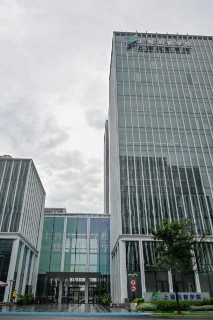 (260710) -- SHANGHAI, July 10, 2026 (Xinhua) -- This photo taken on July 9, 2026 shows a view of Shanghai Innovation Institute in Xuhui District of east China's Shanghai. The institute is working with 31 institutions of higher learning to cultivate top-tier talents for artificial intelligence (AI). It boasts over 80 full-time mentors now, and has enrolled more than 800 doctoral students in 45 majors. The mentors and their students are collaborating in cutting-edge areas such as contextual AI, cognitive AI, and embodied AI. (Xinhua/Chen Shuo)