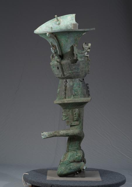 (260710) -- CHENGDU, July 10, 2026 (Xinhua) -- This undated file photo shows the side view of a bronze kneeling figurine with a Zun vessel unearthed from the No. 3 pit at the Sanxingdui Ruins in southwest China's Sichuan Province. TO GO WITH "China Focus: Sanxingdui findings reveal ancient Chinese cultural integration" (Sichuan Provincial Cultural Relics and Archaeology Research Institute/Handout via Xinhua)