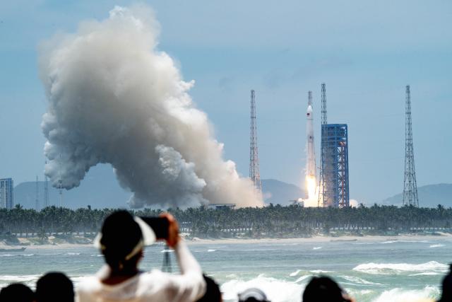 (260710) -- WENCHANG, July 10, 2026 (Xinhua) -- A Long March-10B carrier rocket blasts off from the Hainan commercial spacecraft launch site in Wenchang, south China's Hainan Province, July 10, 2026. China successfully launched the Long March-10B carrier rocket at the Hainan commercial spacecraft launch site in south China's Hainan Province on Friday, achieving its first-ever controlled recovery of a carrier rocket's first stage. (Photo by Meng Zhongde/Xinhua)
