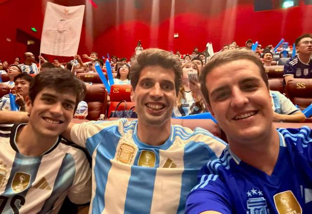 (260710) -- CHENGDU, July 10, 2026 (Xinhua) -- This photo taken with a mobile phone shows Joaquin Estrader (1st R), an Argentine who now lives in Chengdu, posing for a selfie with his friends while enjoying a FIFA World Cup match at a cinema in Chengdu, southwest China's Sichuan Province, July 8, 2026. TO GO WITH "China Focus: Riding on World Cup, Chinese cinemas reinvent moviegoing experience" (Xinhua)