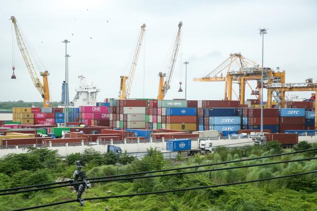 (260710) -- YANGON, July 10, 2026 (Xinhua) -- This photo taken on July 10, 2026 shows a view of a port in Yangon, Myanmar. Myanmar exported over 1 million tons of beans and pulses, maize and sesame seeds in the first three months of the current fiscal year 2026-27, which began in April, earning over 538 million U.S. dollars, according to the Myanmar Pulses, Beans, Maize and Sesame Seeds Merchants Association on Friday. (Xinhua/Myo Kyaw Soe)