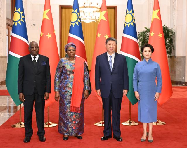 (260710) -- BEIJING, July 10, 2026 (Xinhua) -- Chinese President Xi Jinping and his wife Peng Liyuan pose for a group photo with Namibian President Netumbo Nandi-Ndaitwah and her spouse Epaphras Denga Ndaitwah prior to the talks between Xi and Netumbo Nandi-Ndaitwah in Beijing, capital of China, July 10, 2026. Xi held talks with Netumbo Nandi-Ndaitwah, who is on a state visit to China, at the Great Hall of the People in Beijing on Friday. (Xinhua/Li Xiang)