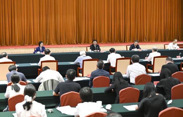 (260710) -- BEIJING, July 10, 2026 (Xinhua) -- Wang Huning, a member of the Standing Committee of the Political Bureau of the Communist Party of China (CPC) Central Committee and chairman of the National Committee of the Chinese People's Political Consultative Conference, speaks at a consultative symposium on the modernization of the industrial system, which focused on research findings from the central committees of non-CPC political parties and the All-China Federation of Industry and Commerce, in Beijing, capital of China, on July 10, 2026. (Xinhua/Zhang Ling)