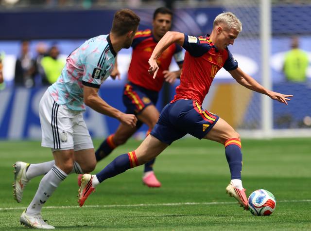 (260711) -- LOS ANGELES, July 11, 2026 (Xinhua) -- Dani Olmo (R) of Spain competes during the quarter final match between Spain and Belgium at the 2026 FIFA World Cup at Los Angeles Stadium in Los Angeles, the United States, July 10, 2026. (Xinhua/Bai Xuefei)