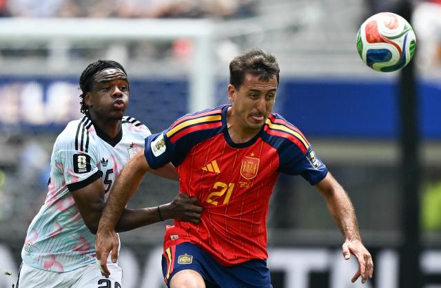 (260711) -- LOS ANGELES, July 11, 2026 (Xinhua) -- Mikel Oyarzabal (R) of Spain vies with Nathan Ngoy of Belgium during the quarter final match between Spain and Belgium at the 2026 FIFA World Cup at Los Angeles Stadium in Los Angeles, the United States, July 10, 2026. (Xinhua/Bai Xuefei)