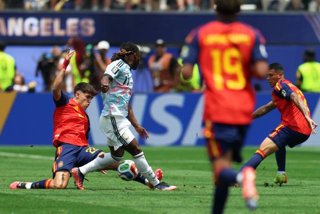 (260711) -- LOS ANGELES, July 11, 2026 (Xinhua) -- Pau Cubarsi (1st L) of Spain vies with Jeremy Doku (2nd L) of Belgium during the quarter final match between Spain and Belgium at the 2026 FIFA World Cup at Los Angeles Stadium in Los Angeles, the United States, July 10, 2026. (Xinhua/Bai Xuefei)