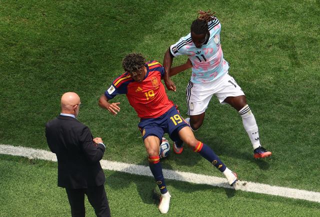 (260711) -- LOS ANGELES, July 11, 2026 (Xinhua) -- Lamine Yamal (C) of Spain vies with Jeremy Doku (R) of Belgium during the quarter final match between Spain and Belgium at the 2026 FIFA World Cup at Los Angeles Stadium in Los Angeles, the United States, July 10, 2026. (Xinhua/Mao Siqian)