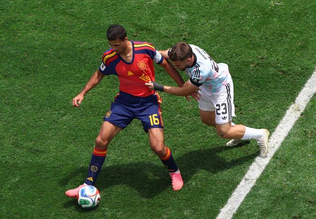 (260711) -- LOS ANGELES, July 11, 2026 (Xinhua) -- Rodri (L) of Spain vies with Nicolas Raskin of Belgium during the quarter final match between Spain and Belgium at the 2026 FIFA World Cup at Los Angeles Stadium in Los Angeles, the United States, July 10, 2026. (Xinhua/Mao Siqian)