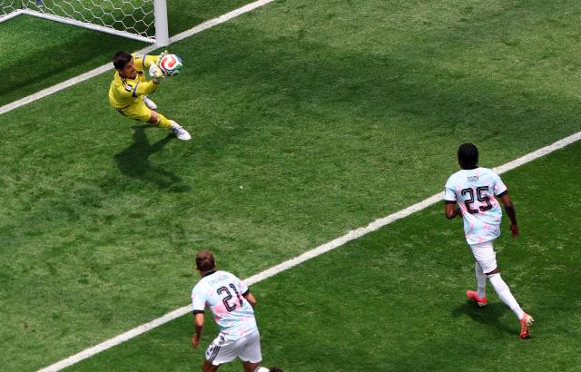 (260711) -- LOS ANGELES, July 11, 2026 (Xinhua) -- Thibaut Courtois (L), goalkeeper of Belgium makes a save during the quarter final match between Spain and Belgium at the 2026 FIFA World Cup at Los Angeles Stadium in Los Angeles, the United States, July 10, 2026. (Xinhua/Mao Siqian)