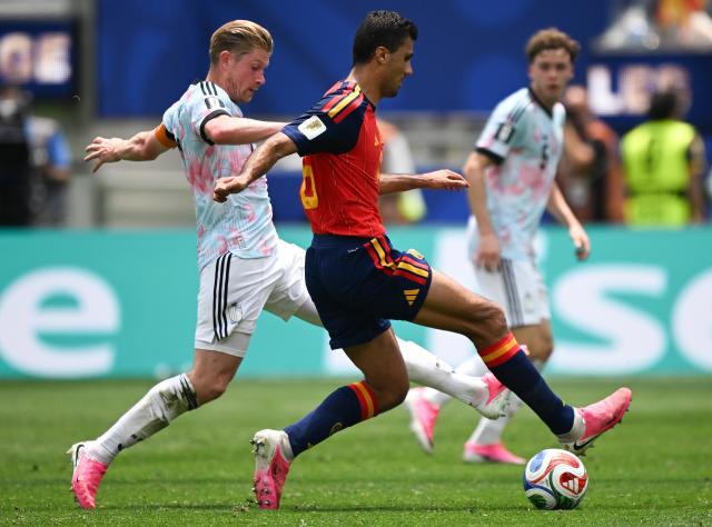 (260711) -- LOS ANGELES, July 11, 2026 (Xinhua) -- Rodri (C) of Spain vies with Kevin De Bruyne (L) of Belgium during the quarter final match between Spain and Belgium at the 2026 FIFA World Cup at Los Angeles Stadium in Los Angeles, the United States, July 10, 2026. (Xinhua/Wu Xiaoling)