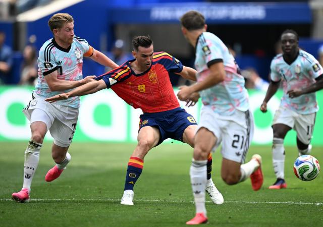(260711) -- LOS ANGELES, July 11, 2026 (Xinhua) -- Fabian Ruiz (2nd L) of Spain vies with Kevin De Bruyne (1st L) of Belgium during the quarter final match between Spain and Belgium at the 2026 FIFA World Cup at Los Angeles Stadium in Los Angeles, the United States, July 10, 2026. (Xinhua/Wu Xiaoling)