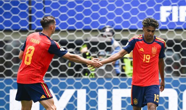 (260711) -- LOS ANGELES, July 11, 2026 (Xinhua) -- Fabian Ruiz (L) and Lamine Yamal of Spain react during the quarter final match between Spain and Belgium at the 2026 FIFA World Cup at Los Angeles Stadium in Los Angeles, the United States, July 10, 2026. (Xinhua/Wu Xiaoling)